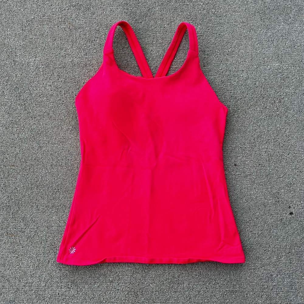 Women’s bright pink Athleta athletic tank top with built in bra